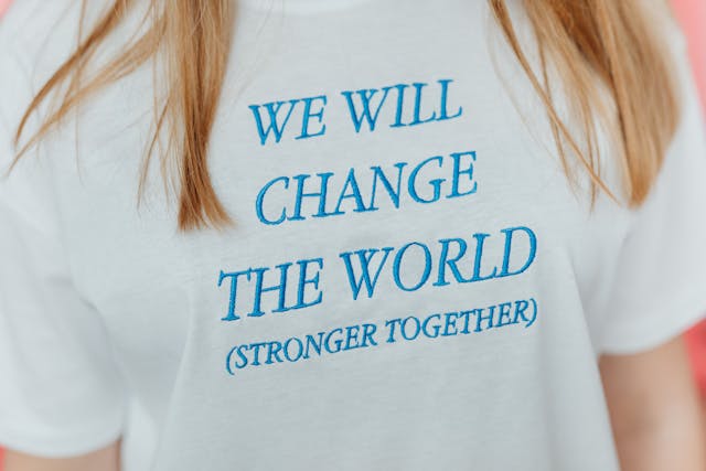 woman-in-white-t-shirt-with-blue-text