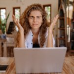 photo-of-woman-showing-frustrations-on-her-face